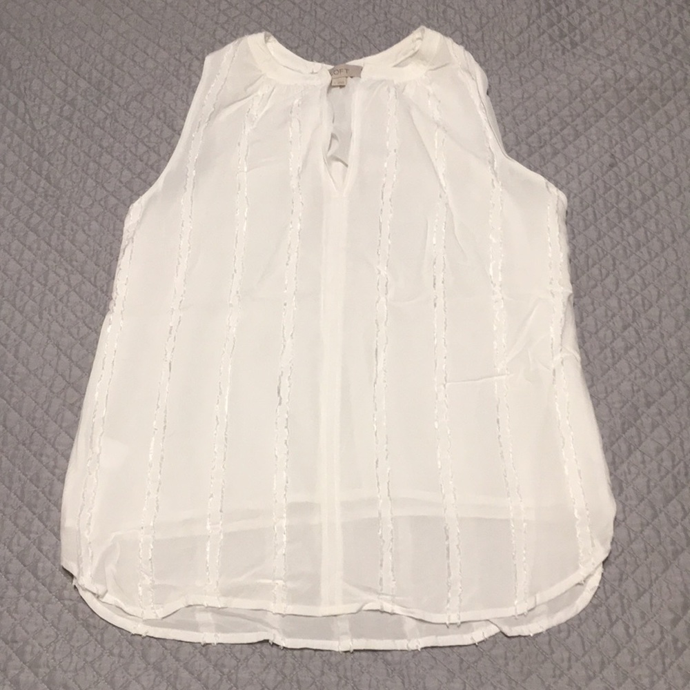 White blouse with textured detail